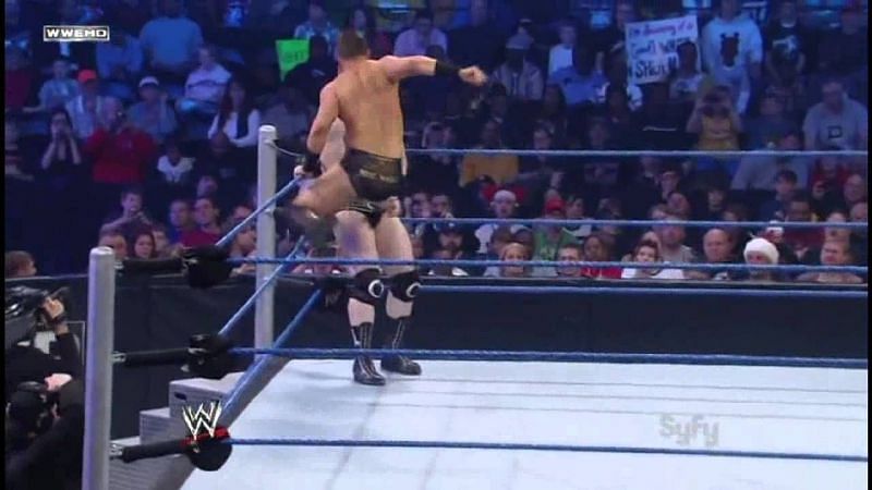 The Miz flying into the corner with his swinging corner clothesline.